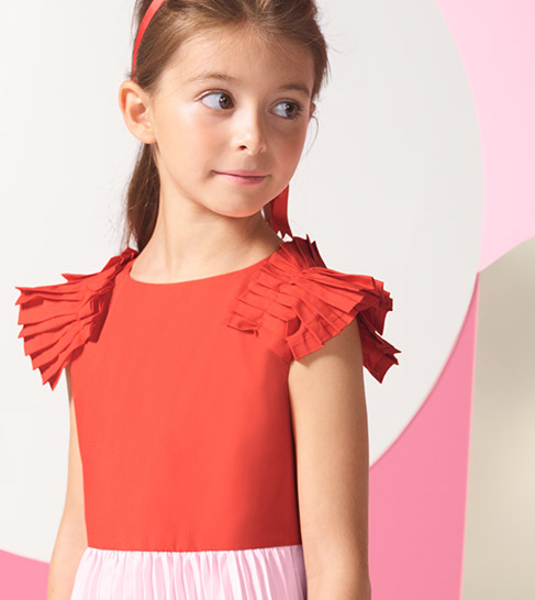 Petite fille portant robe rose et rouge, dès 69€